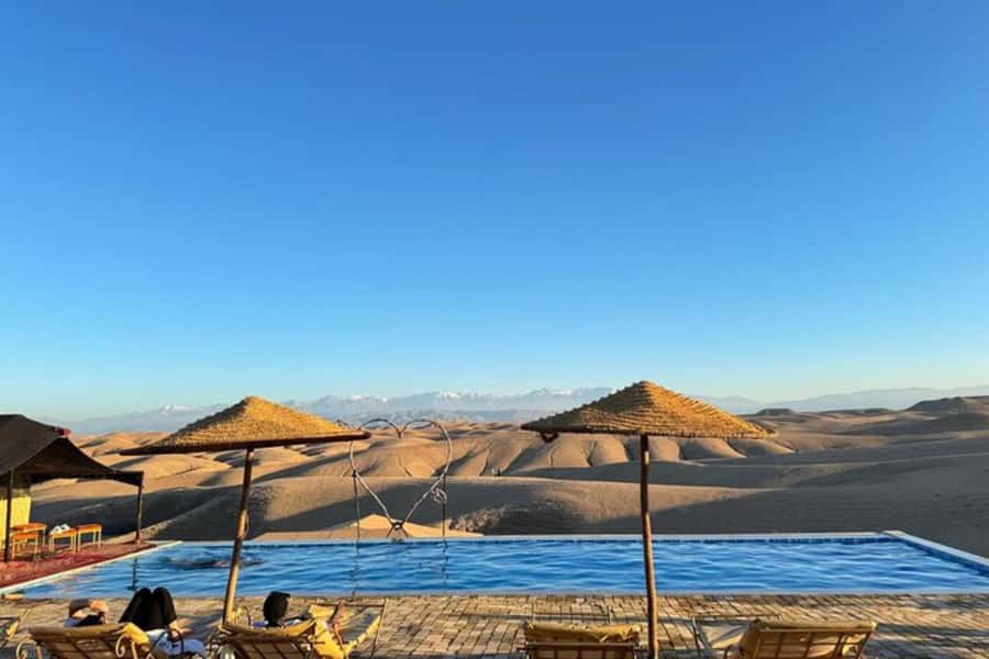 Agafay Desert Day: Quad Bike, Lunch & Swim Adventure - Getting out of Marrakech: pickup, drive time, and an argan oil tea stop