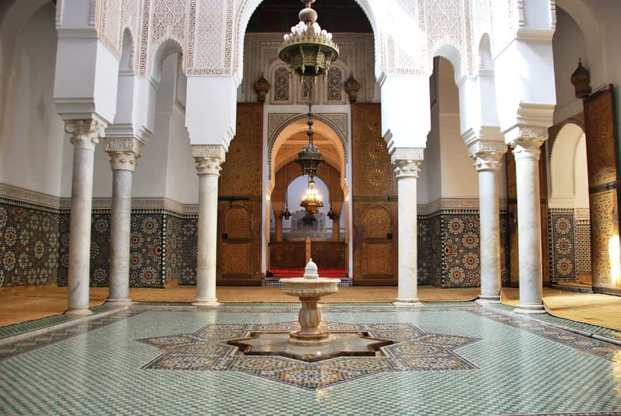 From Fes: Meknes Volubilis and Moulay Idriss Day Trip - City walls, Mausoleum of Moulay Ismail, and Moroccan Art Museum