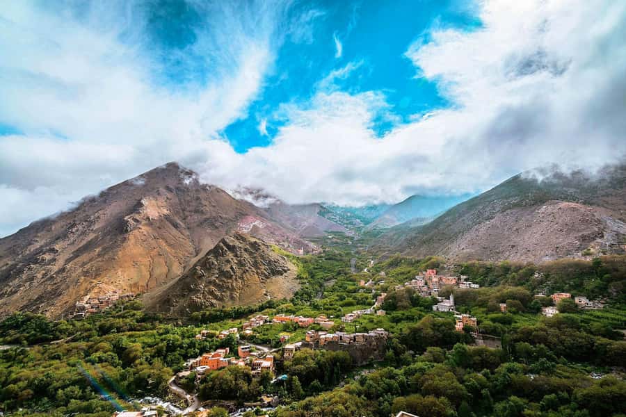 From Marrakech: Atlas Mountains Full-Day Hiking Trip w Lunch - Agafay Desert camel ride and quick photo stops