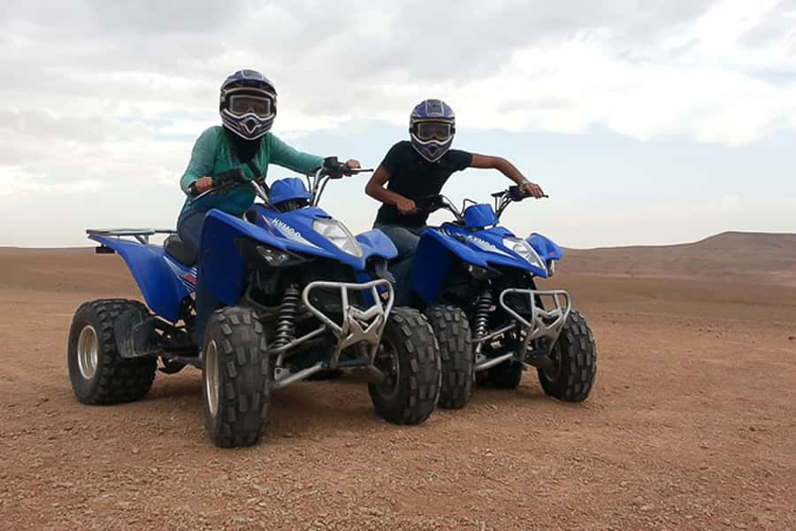 From Marrakech: Guided Quad Biking Tour in Agafay Desert - Getting on the quad: training, gear, and what to wear