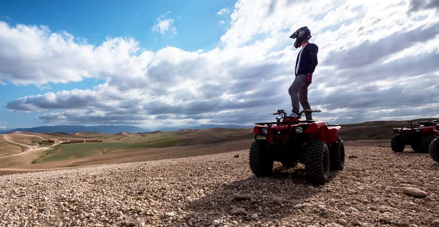 From Marrakech: Premium Agafay Desert Half-Day Quad Biking - Getting to the desert: pickup, drive time, and the oasis start