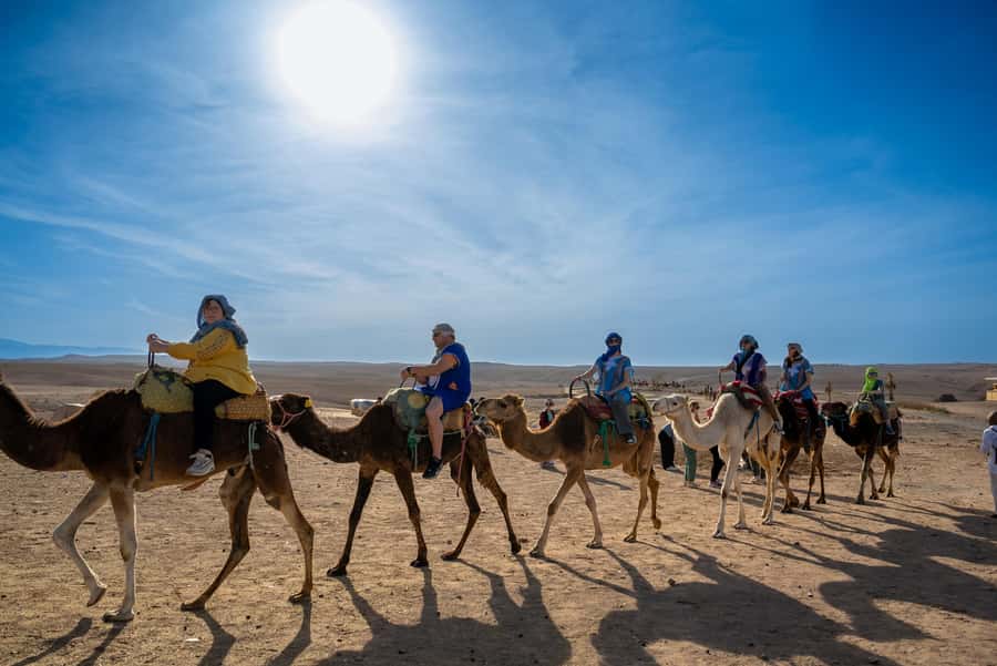 From Marrakech: Sunset Desert Tour with Camel Ride & Dinner - Bonfire, music, and the fire show under the desert sky