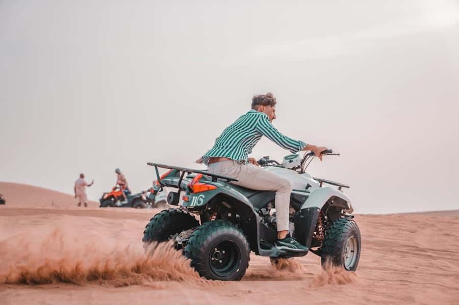 Marrakech: Agafay Desert Quad Bike with Camels & Dinner Show - Quad biking adrenaline: shared rides, safety basics, and staying comfortable