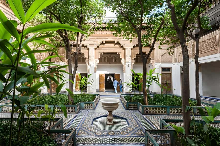 Marrakech: Bahia Palace, Ben Youssef Medersa, & Souks Tour - Ben Youssef Medersa: the courtyard calm after the palace spectacle