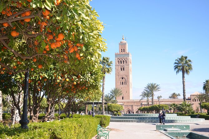 Marrakech: Bahia Palace, Saadian Tombs, Souk and Medina Tour - Koutoubia Mosque Photo Stop: Almohad Lines and Prayer-Time Reality