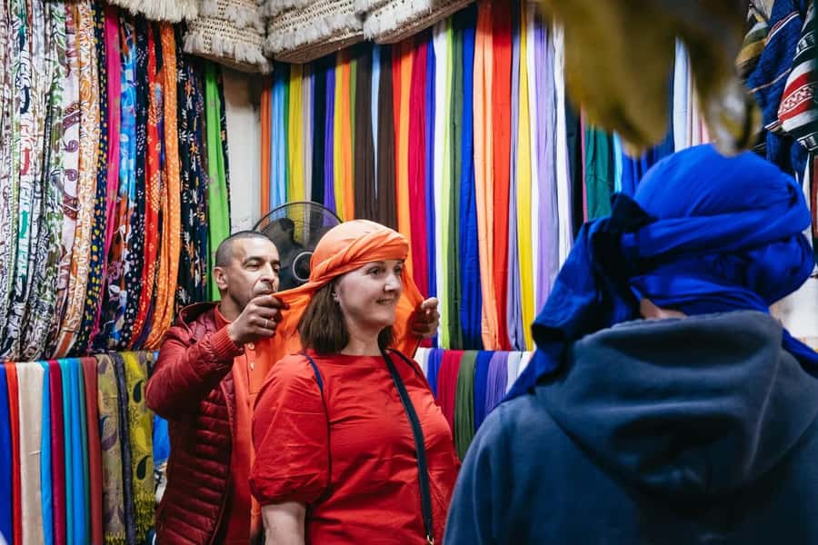 Marrakech: Ben Youssef, Secret Garden, & Souks Walking Tour - Koutoubia Mosque pass-by: quick context without the long detour