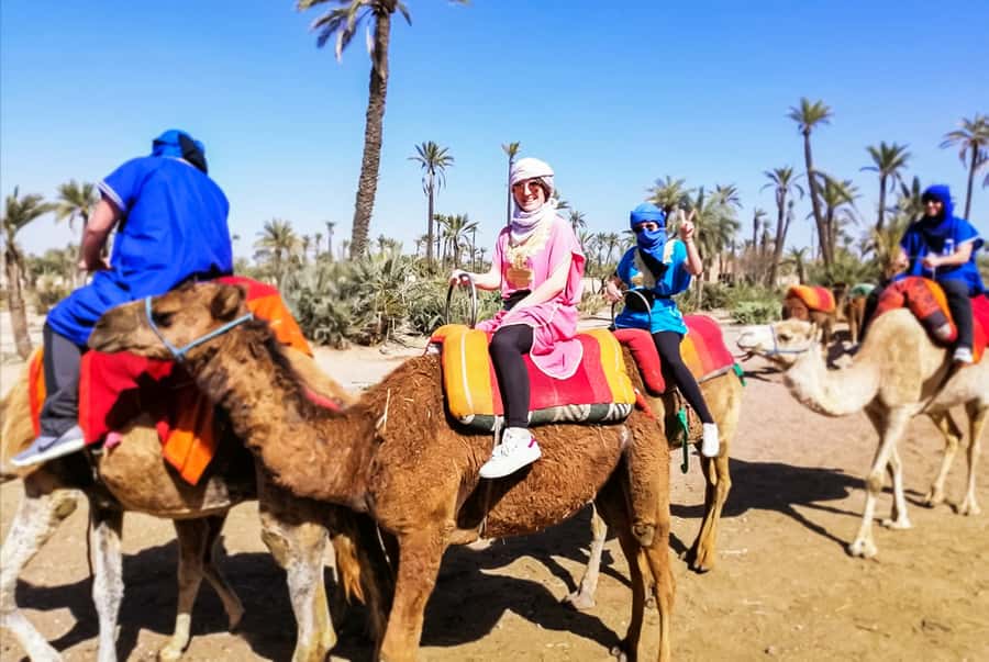 Marrakech: Camel Ride in the Oasis Palmeraie - Traditional clothing: why the jilbab and scarf feel more than costume