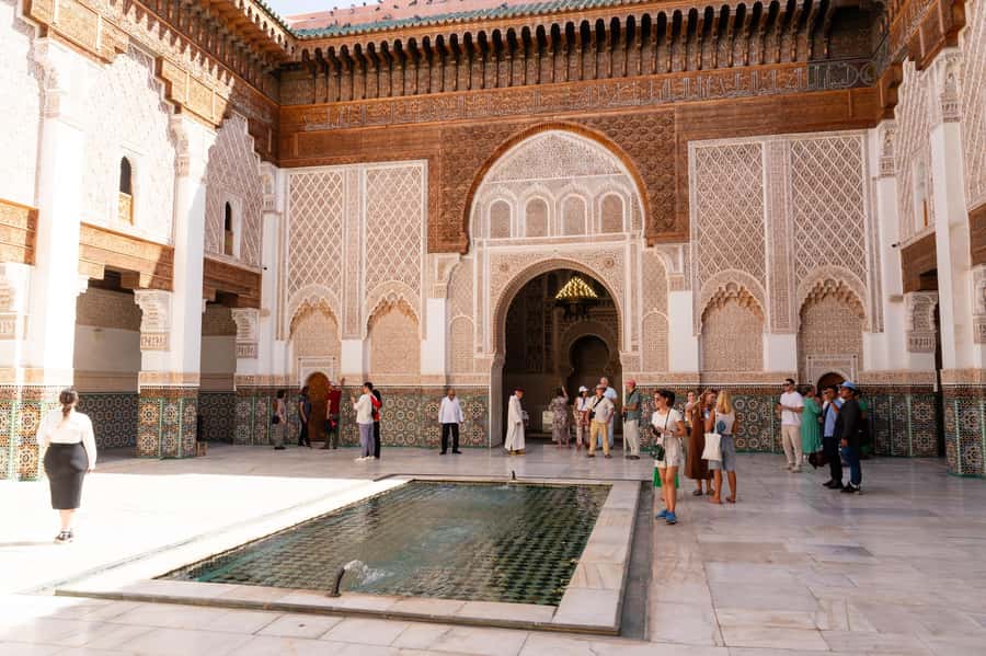 Marrakech: Madrassa Ben Youssef, Secret Garden & Medina Tour - Souk Semmarine and the Artisan Reality Check