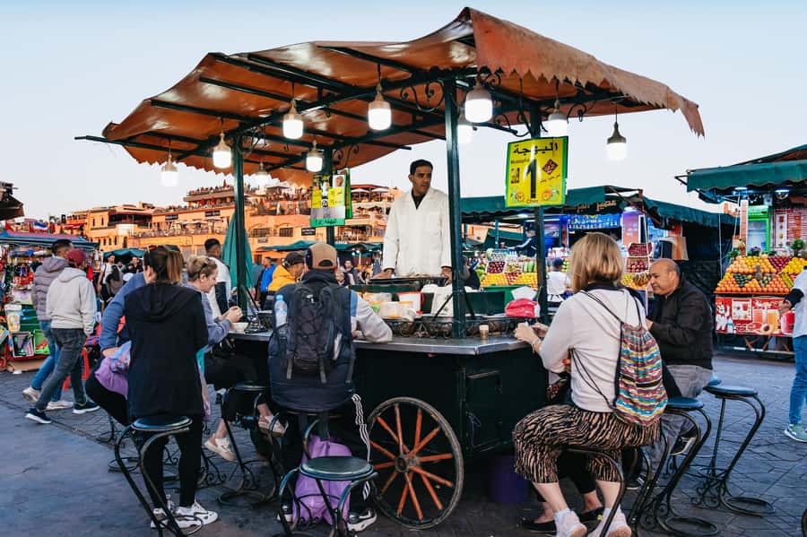 Marrakech: Medina by Night Walking Tour with Moroccan Tea - Souks, Fabrics, and Barter: Shopping Without Losing Your Cool
