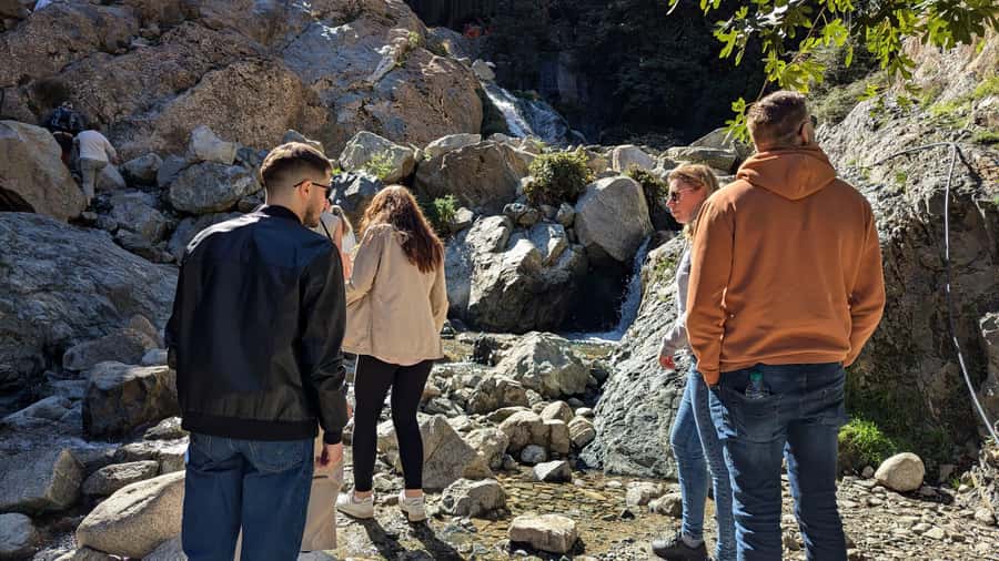 Marrakech: Ourika Valley Waterfalls & Atlas Mountains Trip - Ourika Valley Stop: Photos, Shopping, and Riverside Atmosphere