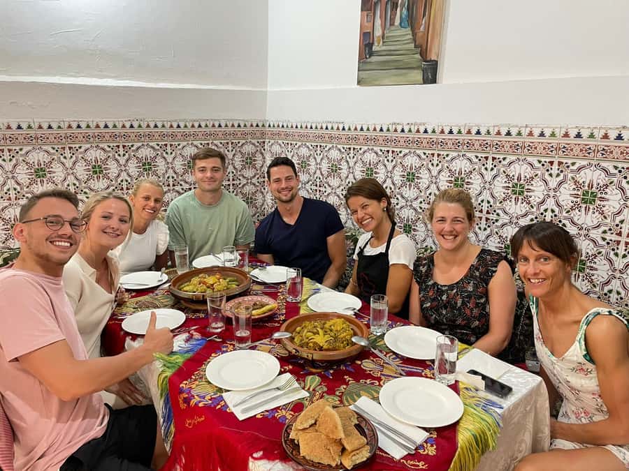 Marrakech: Traditional Moroccan Cooking Class & Market Visit - Inside Khmisa Workshops: A Medina Riad Meal Setup