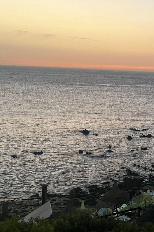 Tangier: Sunset, Tea, Sweets, Camel Ride, and Hercules Caves - Cap Spartel and the meeting of seas at golden hour